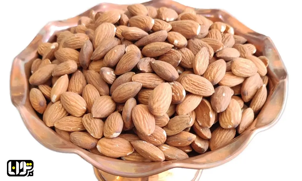 بادام و کاهش استرس چطور به هم مرتبطاند؟ عکس بادام درختی در ظرف